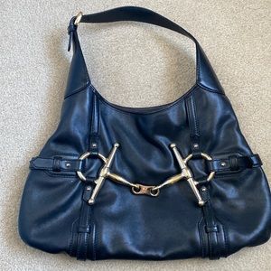 Black with gold hardware Gucci shoulder bag hobo